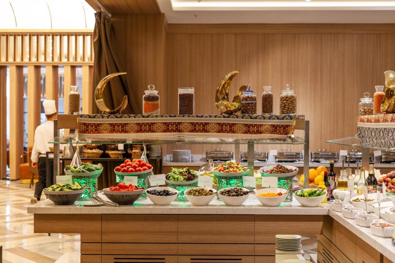 Intercontinental Baku By Ihg Hotel Exterior photo A buffet at a hotel